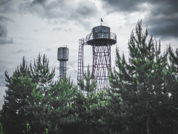 Low angle view of water tower against sky