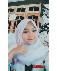 Portrait of cute girl smiling