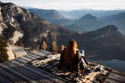 Rear view of woman looking at mountains