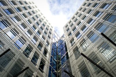 Low angle view of modern building against sky