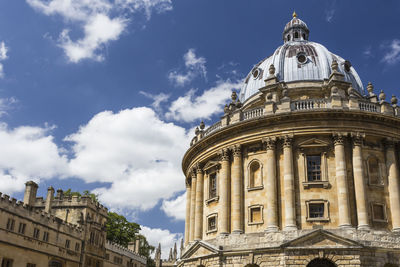 Low angle view of cathedral against cloudy sky