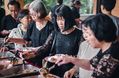 Group of people eating food