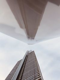 Low angle view of modern building against sky