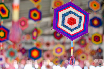 Close-up of multi colored hanging for sale in market