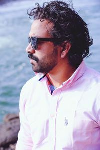 Portrait of young man looking away