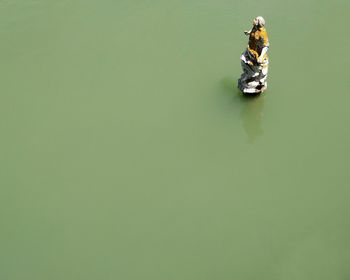 High angle view of boat floating on lake