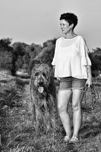 Woman with pet irish wolfhound