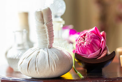 Hot compress massage. spa compress ball and lotus flower.