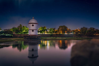 Scenic view of historic site against sky at night