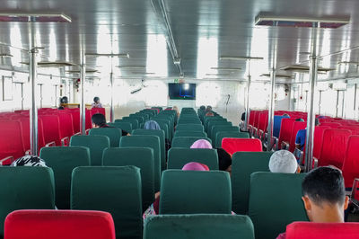 Rear view of people sitting in auditorium