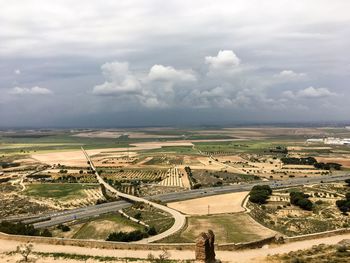 High angle view of highway in city against sky