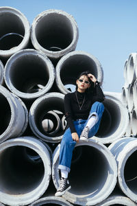 Portrait of young woman wearing sunglasses