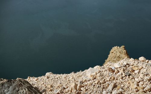 Close-up of rocks in water