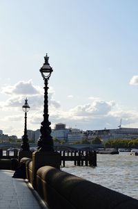 View of buildings against cloudy sky