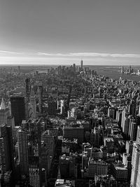 High angle view of city buildings against sky