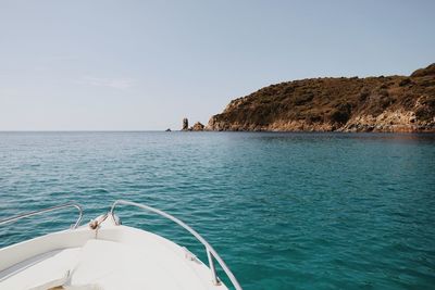 Boat in sea against clear sky