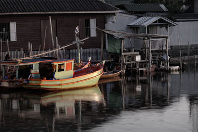 Moored boats against built structures