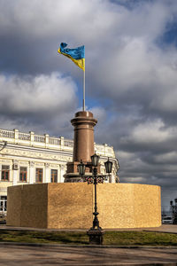Ukrainian flag on the site of the former monument to catherine the great in odessa, ukraine