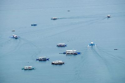 High angle view of boats sailing in sea