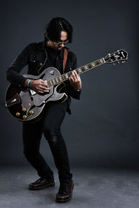 Young man playing guitar