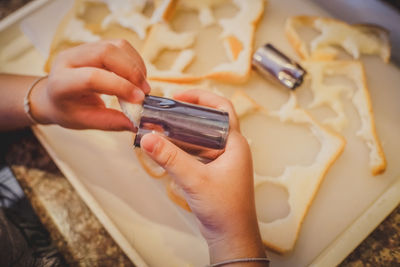 Close-up of person preparing food