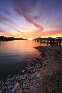 Scenic view of sea against sky during sunset