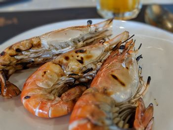 High angle view of fish in plate on table