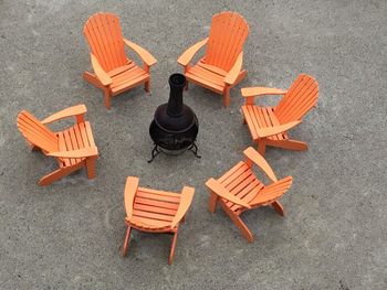 High angle view of chairs on beach