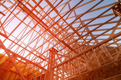 Low angle view of construction site against sky