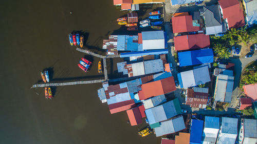 High angle view of houses by harbor