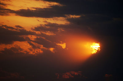 Low angle view of dramatic sky during sunset