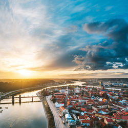 High angle view of buildings against sky during sunset