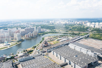 High angle view of river amidst buildings in city