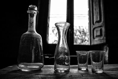 Close-up of wine bottles on table