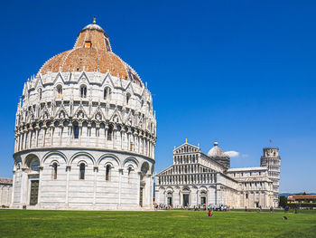 Exterior of temple against clear blue sky