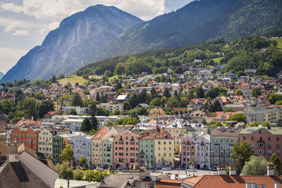 High angle view of townscape against mountains