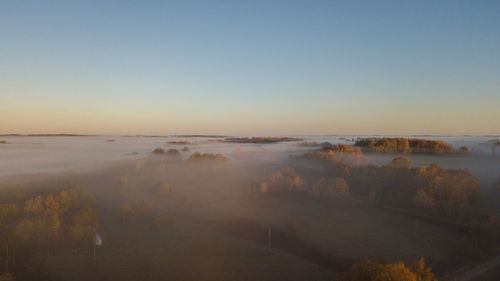 High angle view of trees on landscape against sky