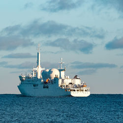 Ship in sea against sky