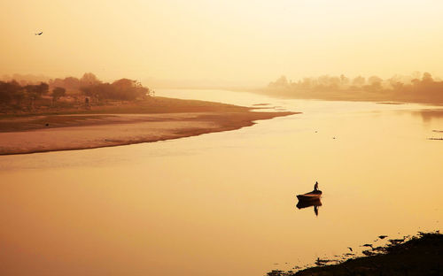 Scenic view of yamuna river during sunset