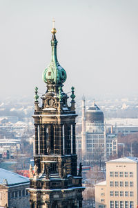 View of buildings against sky in city