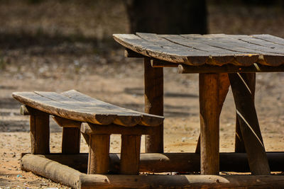 Empty bench on table in park