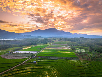 High angle view of townscape against sky during sunset
