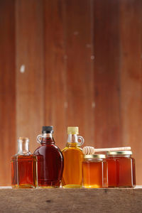 Close-up of honey in jars on table