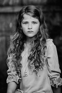 Portrait of girl sitting at home