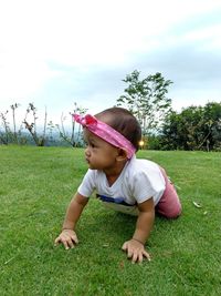 Baby girl on grass