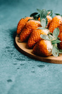 Close-up of served fruits in plate