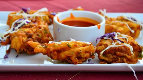 Close-up of served food on table