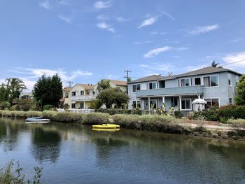 Buildings by water against sky, venice canals