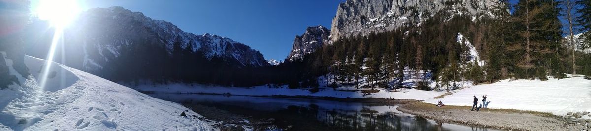 Panoramic shot of snowcapped mountains against sky