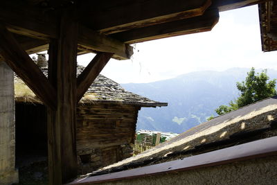 Low angle view of house against sky during winter